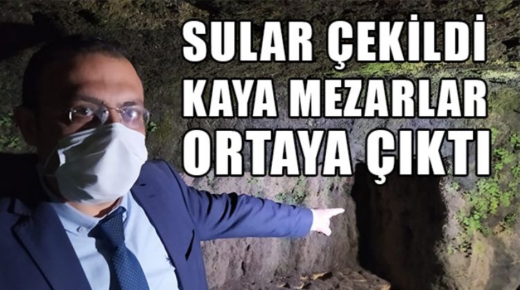 TARSUS’TA BERDAN IRMAĞINDA SULARIN ÇEKİLMESİYLE KAYA MEZARLAR ORTAYA ÇIKTI