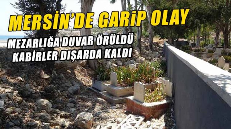 Örülen duvar mezarlığı ikiye böldü