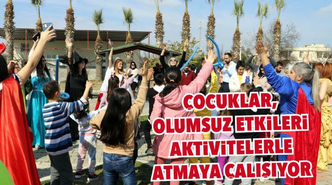 MERSİN'DEKİ DEPREMZEDE ÇOCUKLAR DEPREMİN ETKİLERİNİ EĞLENEREK ATIYOR