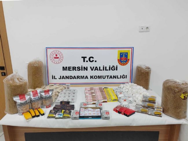 Mersin'de kaçak tütün ve 65 adet sigara sarma makinesi ele geçirildi