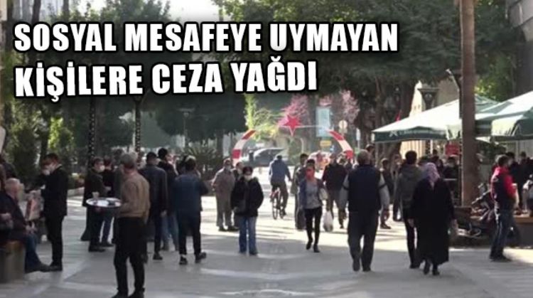 TARSUS'TA SOSYAL MESAFEYE UYMAYAN 20 KİŞİYE 63 BİN LİRA PARA CEZASI