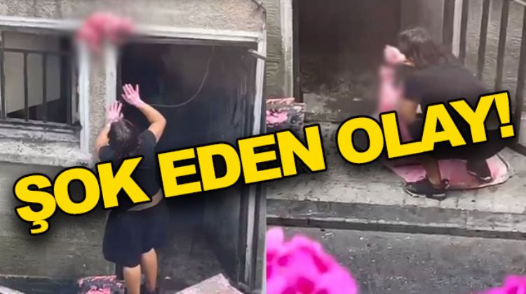 ÖLÜ KEDİYİ BOYAYIP KAPIYA ASTI