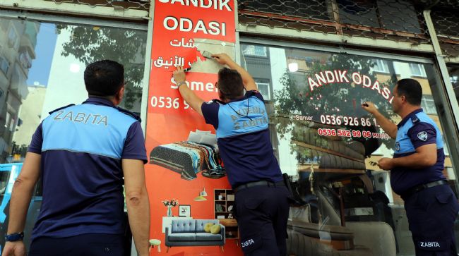 AKDENİZ’DE ARAPÇA YAZILI TABELA VE REKLAMLAR KALDIRILIYOR