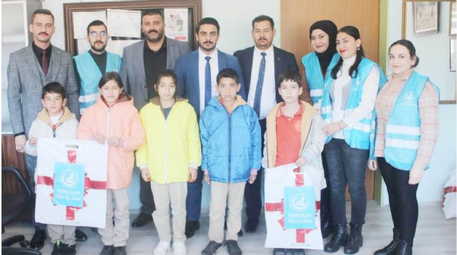TOROSLAR ÜLKÜ OCAKLARI’NDAN ÇOCUKLARA MONT YARDIMI