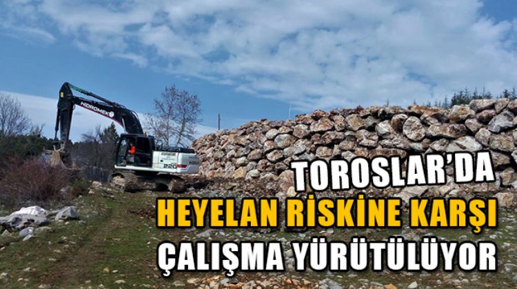 TOROSLAR’DA ATLILAR MAHALLESİ’NDEKİ ESKİ OKULUN ÇEVRESİNE İSTİNAT DUVARI ÖRÜLDÜ