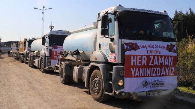 AKDENİZ BELEDİYESİNDEN DEPREM BÖLGESİNE SU VE YAKACAK DESTEĞİ